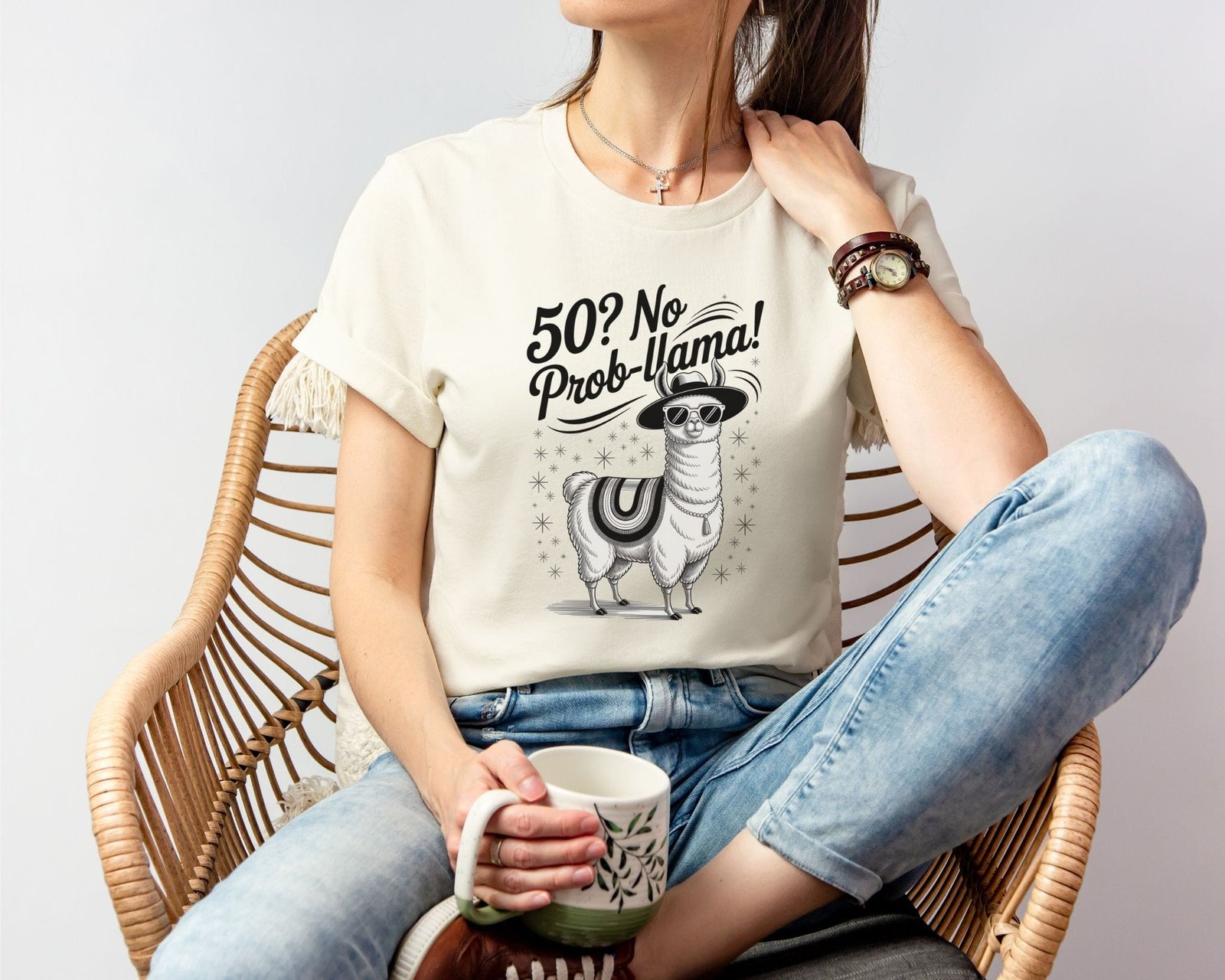 50th birthday t-shirt with a stylish llama wearing sunglasses and a hat, featuring the phrase "50? No Prob-Llama!" in a fun, handwritten font