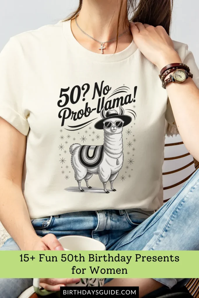 A cream-colored birthday t-shirt with a stylish illustrated llama wearing sunglasses and a hat, accompanied by the phrase "50? No Prob-Llama!
