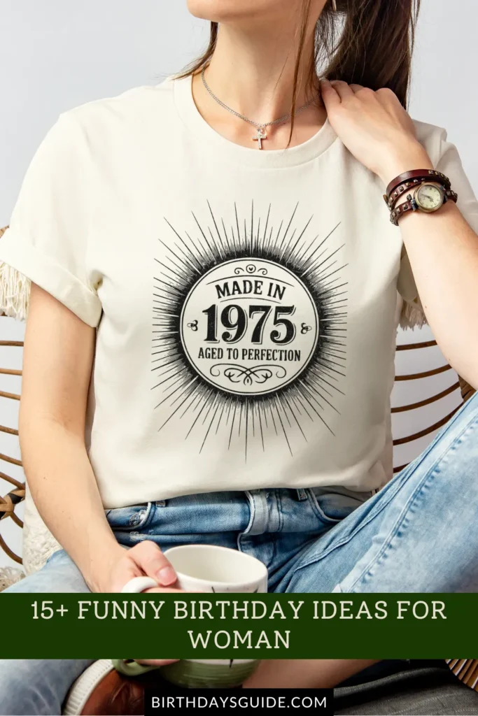 A cream-colored birthday t-shirt with a vintage-inspired circular design that reads "Made in 1975 - Aged to Perfection," surrounded by a bold sunburst pattern.